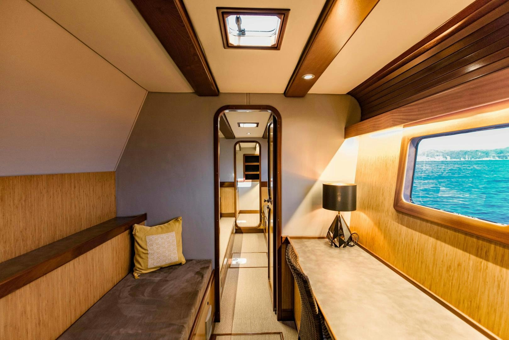 a train car with a bench aboard IETA Yacht for Sale