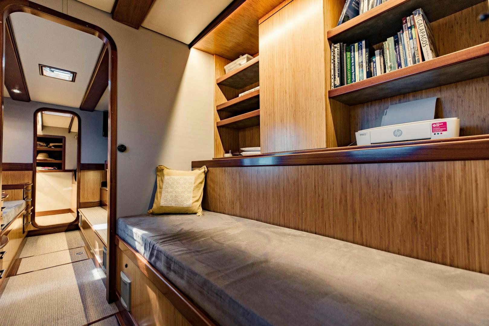 a bed in a room aboard IETA Yacht for Sale