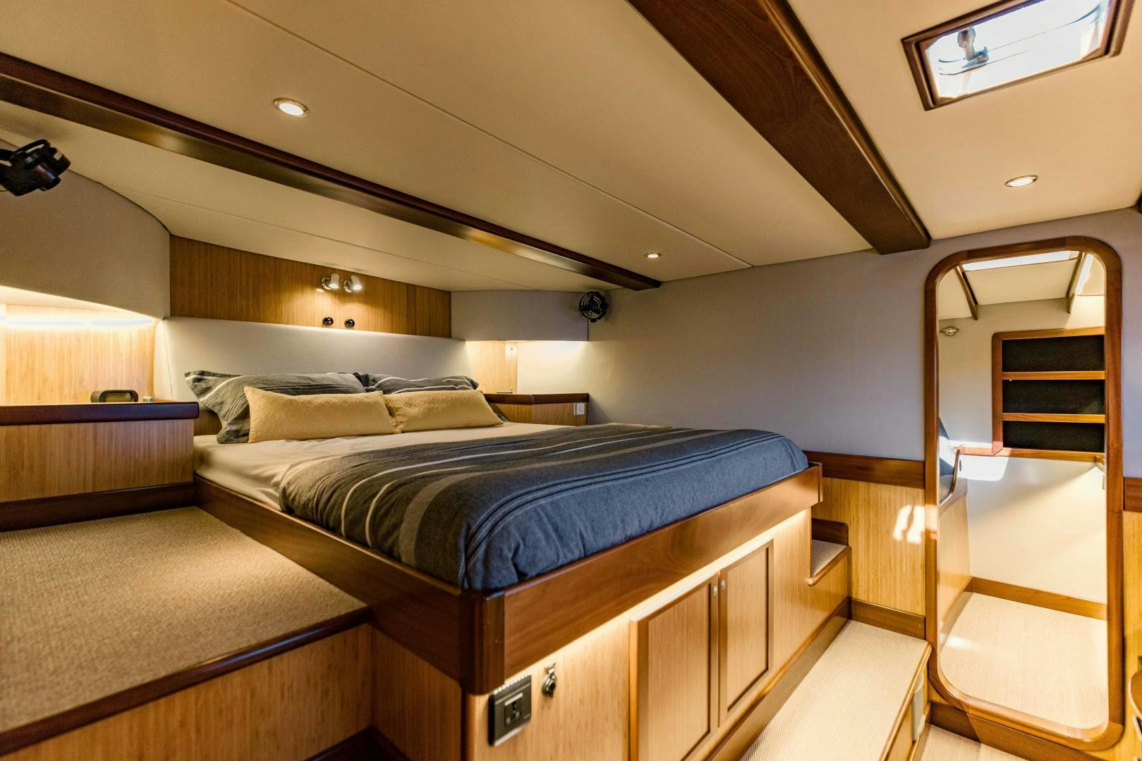 a bedroom with a bunk bed aboard IETA Yacht for Sale