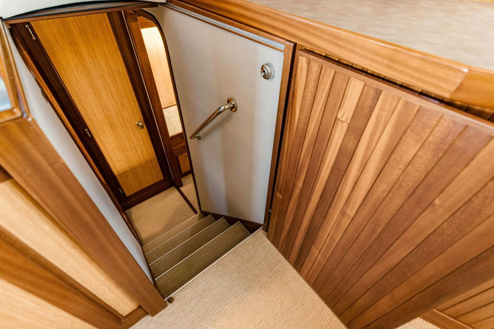 a wooden door with a handle aboard IETA Yacht for Sale