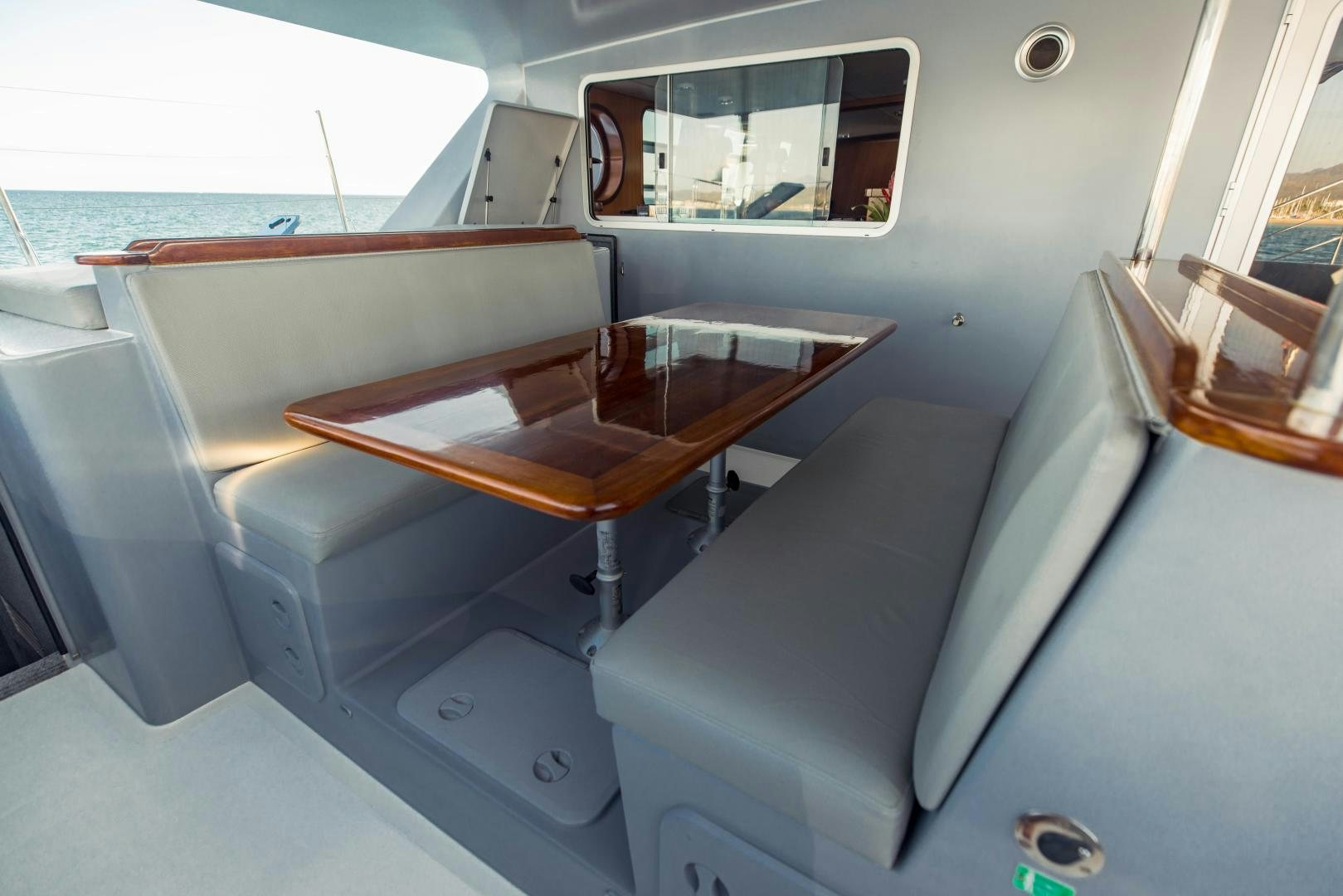 a boat with a seat aboard IETA Yacht for Sale