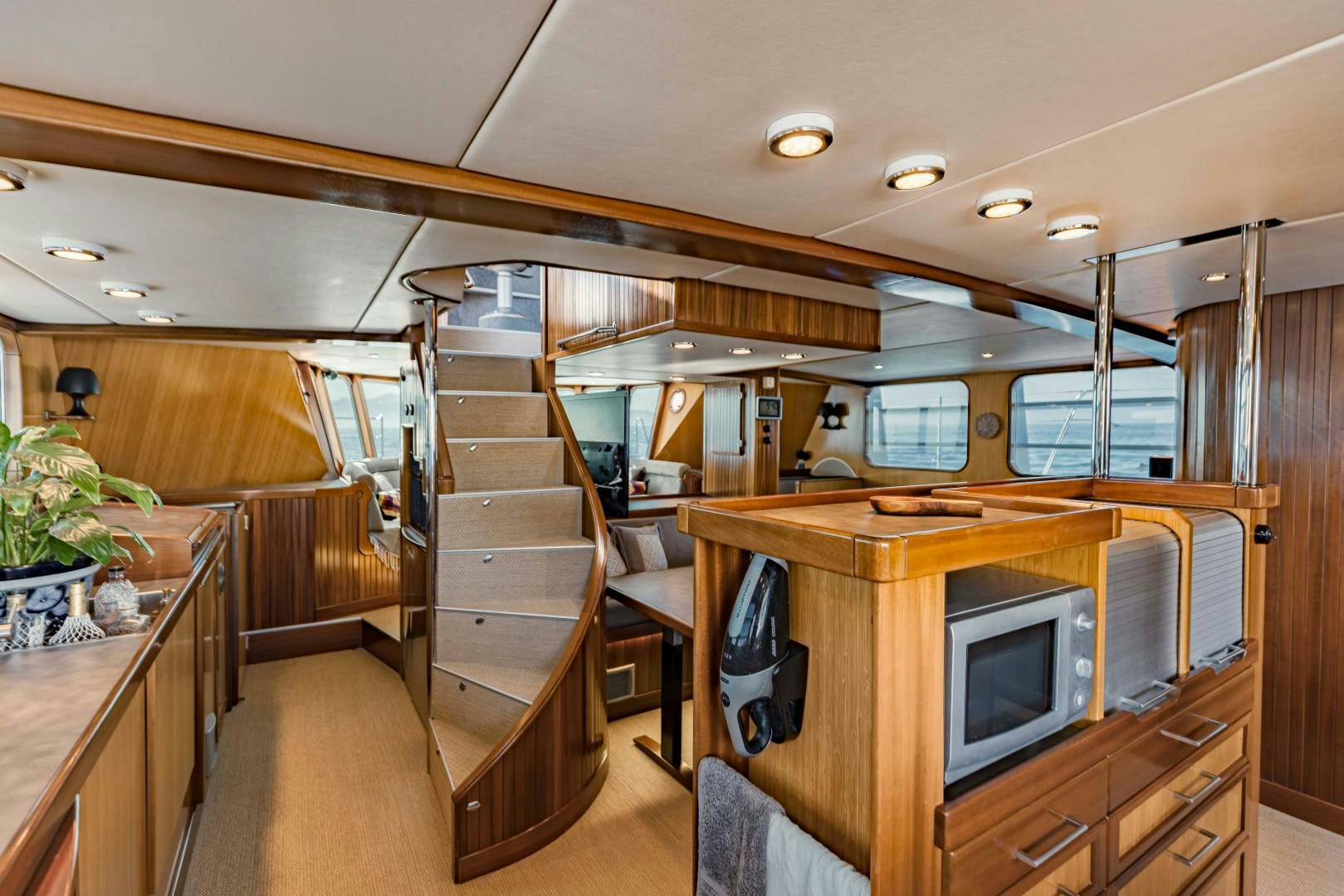a room with a desk and a tv aboard IETA Yacht for Sale