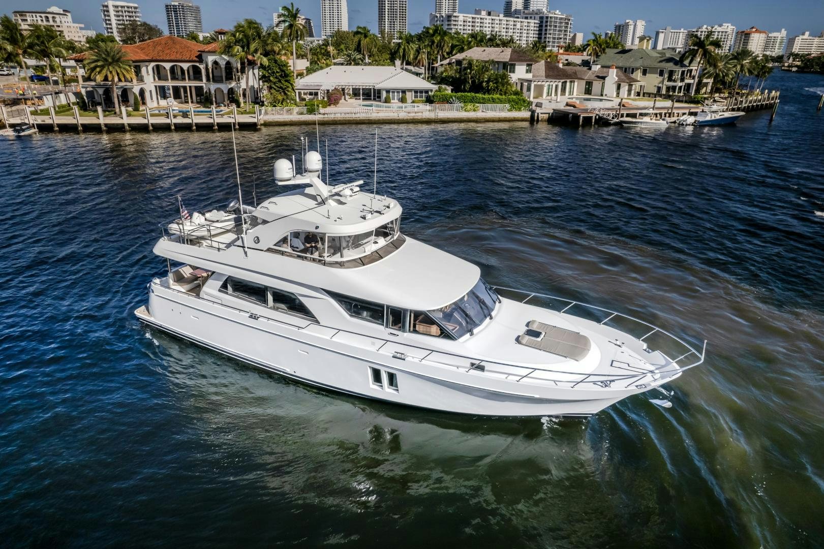 a white yacht in the water aboard JOURNEY Yacht for Sale