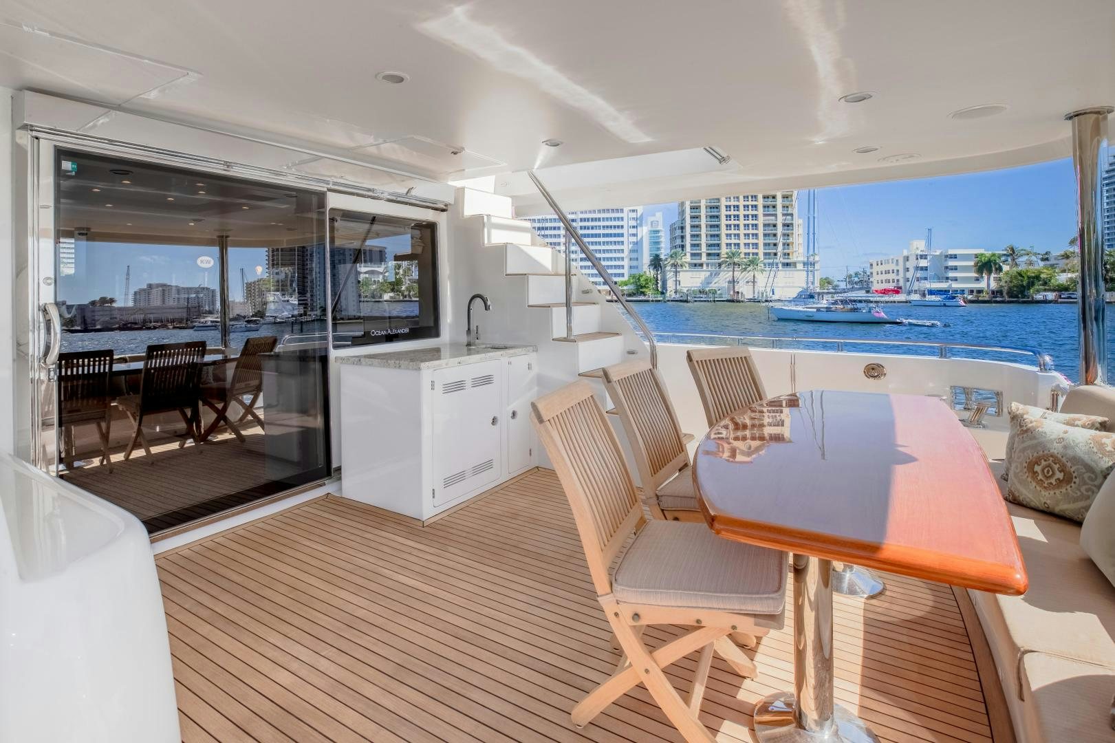 a room with a table and chairs aboard JOURNEY Yacht for Sale