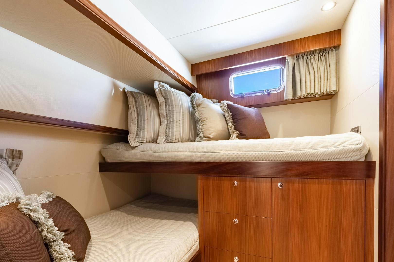 a bed with white sheets aboard JOURNEY Yacht for Sale