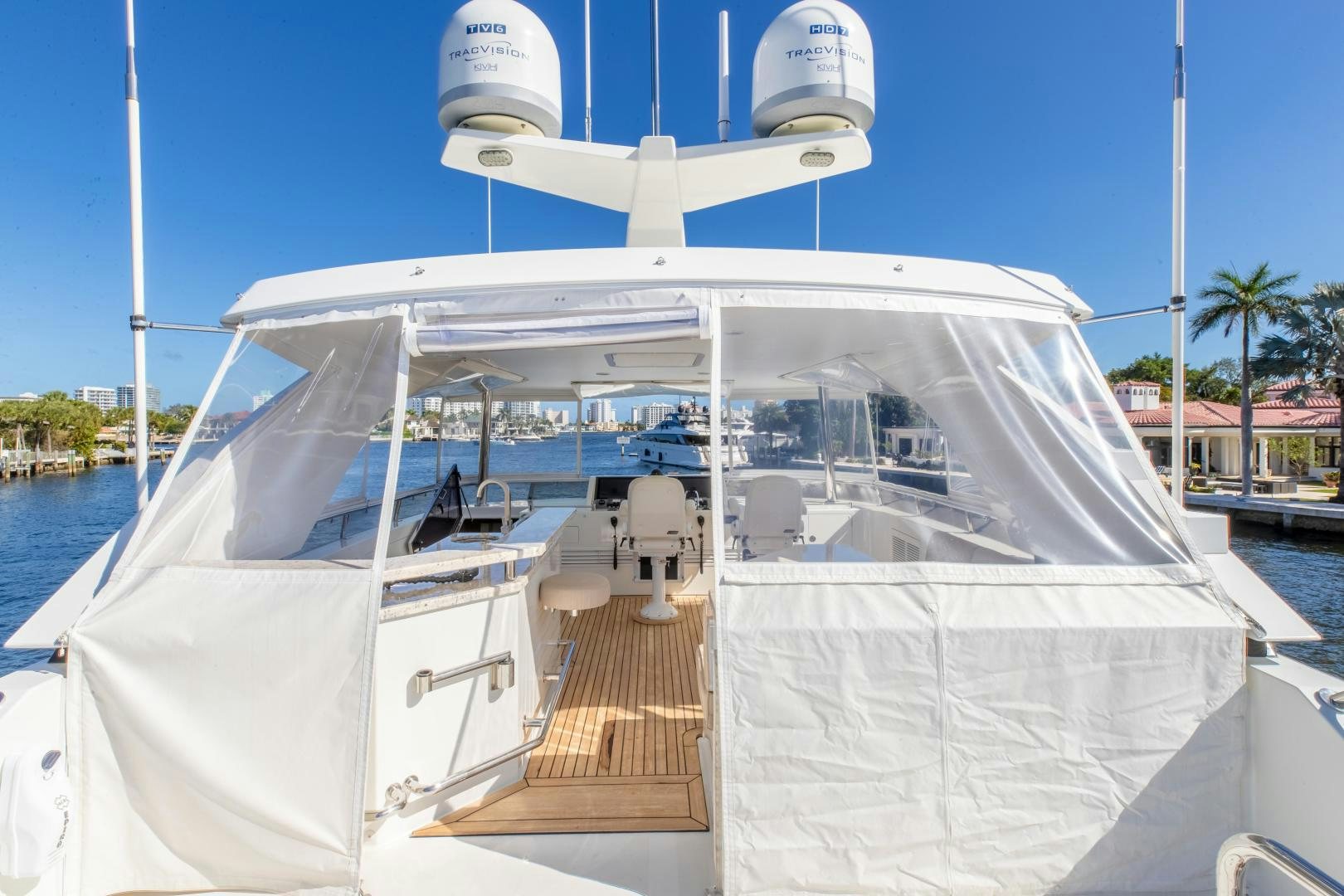 a white boat on a dock aboard JOURNEY Yacht for Sale