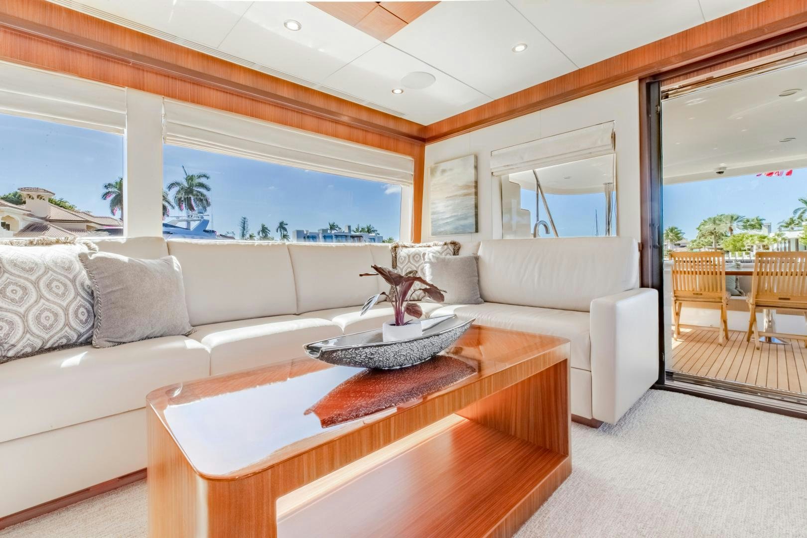 a living room with a large window aboard JOURNEY Yacht for Sale