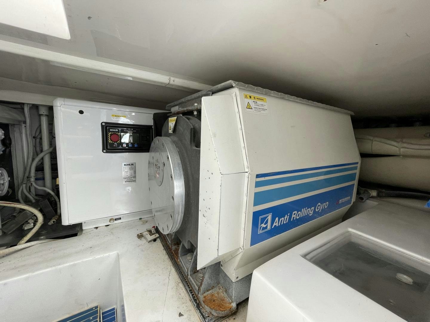 a large machine in a room aboard ONIX Yacht for Sale