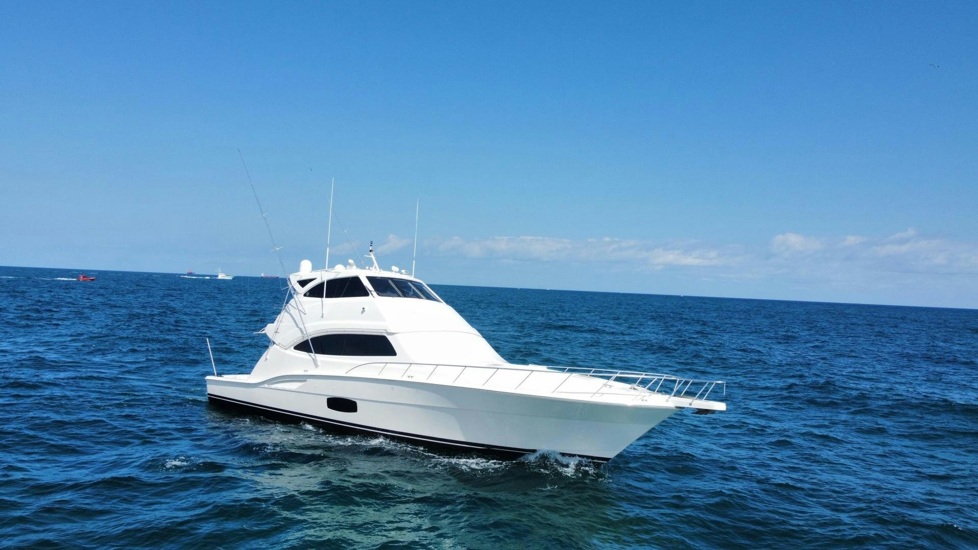 a white yacht in the water aboard ONIX Yacht for Sale