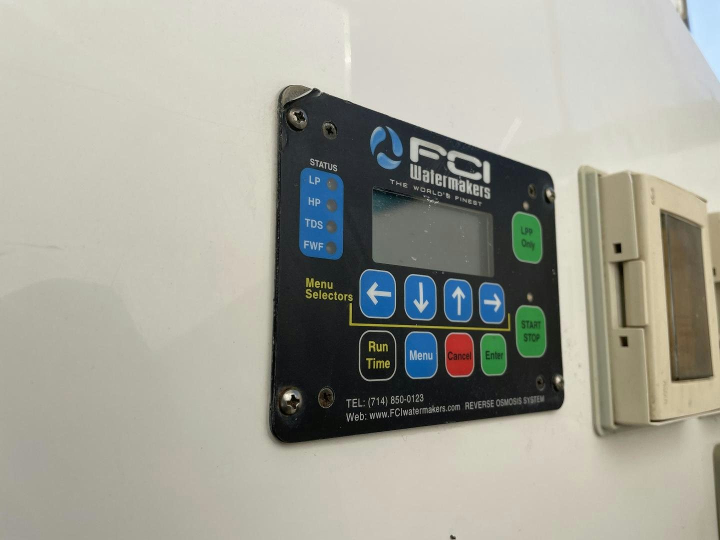 a rectangular electronic device aboard ONIX Yacht for Sale