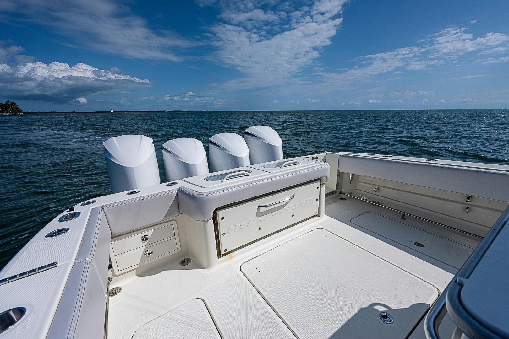 a boat with white seats aboard S3XY Yacht for Sale