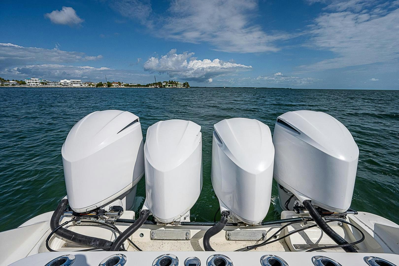 a group of white toilets on a boat in the water aboard S3XY Yacht for Sale