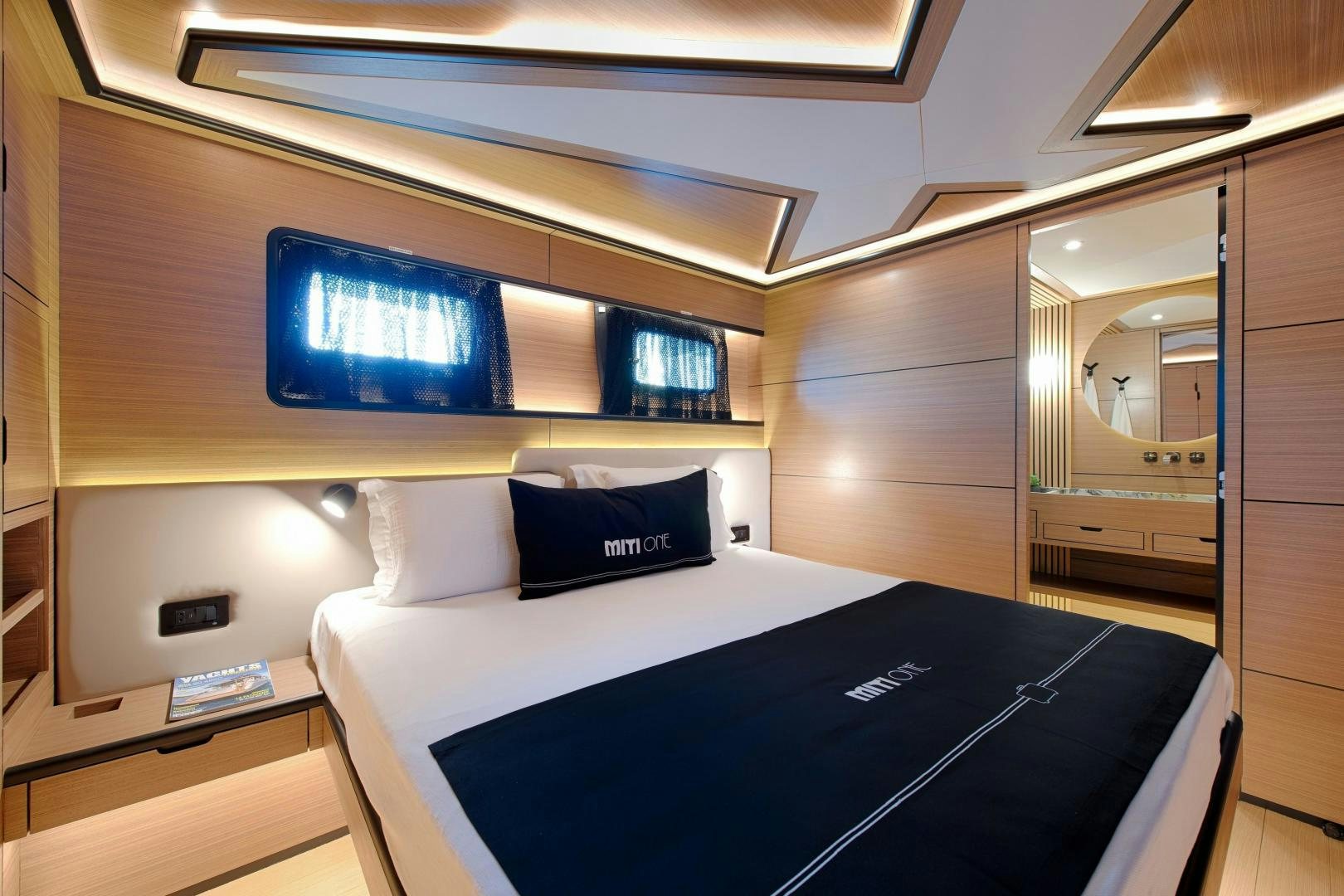 a bed in a room aboard MITI ONE Yacht for Sale