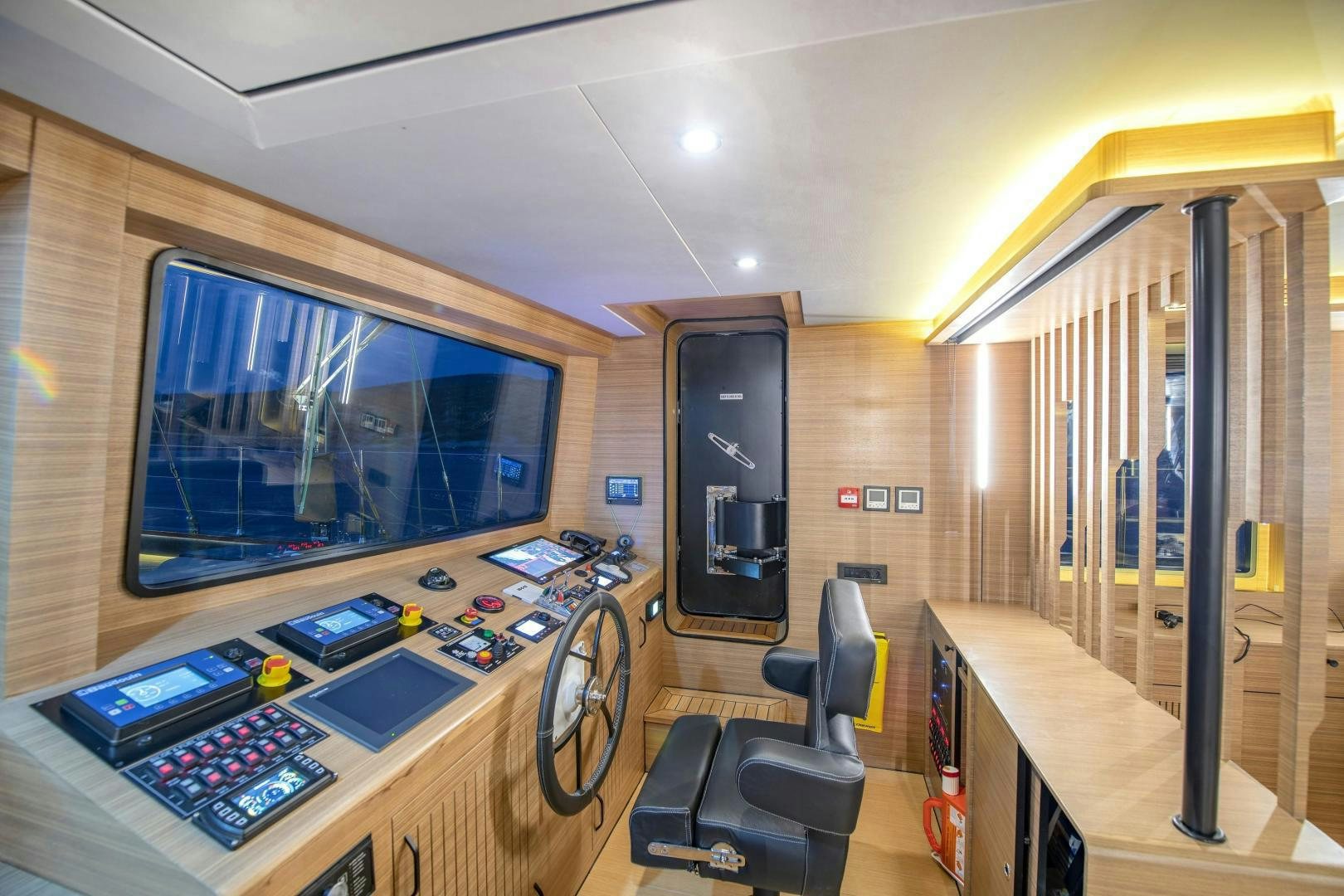 a room with a large screen aboard MITI ONE Yacht for Sale