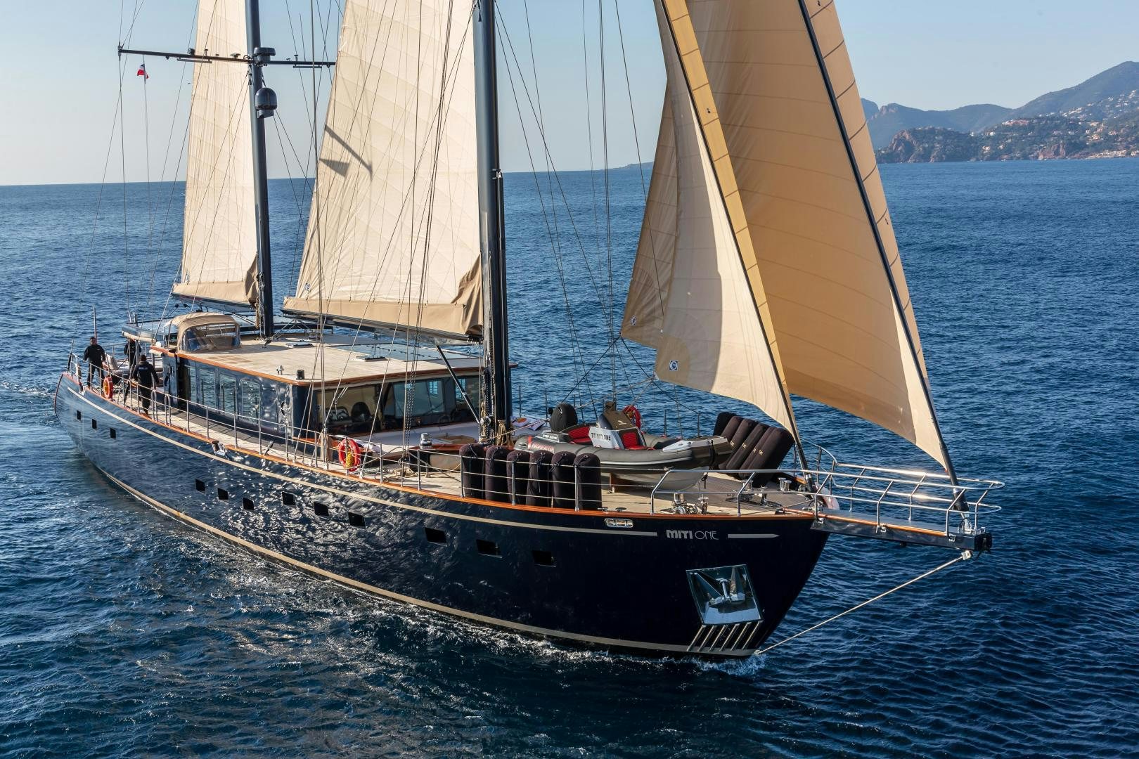 a boat sailing on the water aboard MITI ONE Yacht for Sale