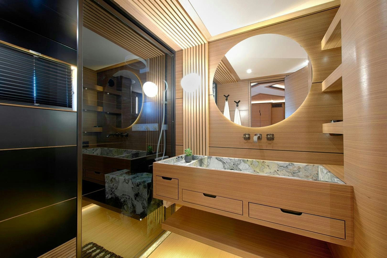 a bathroom with a large mirror aboard MITI ONE Yacht for Sale