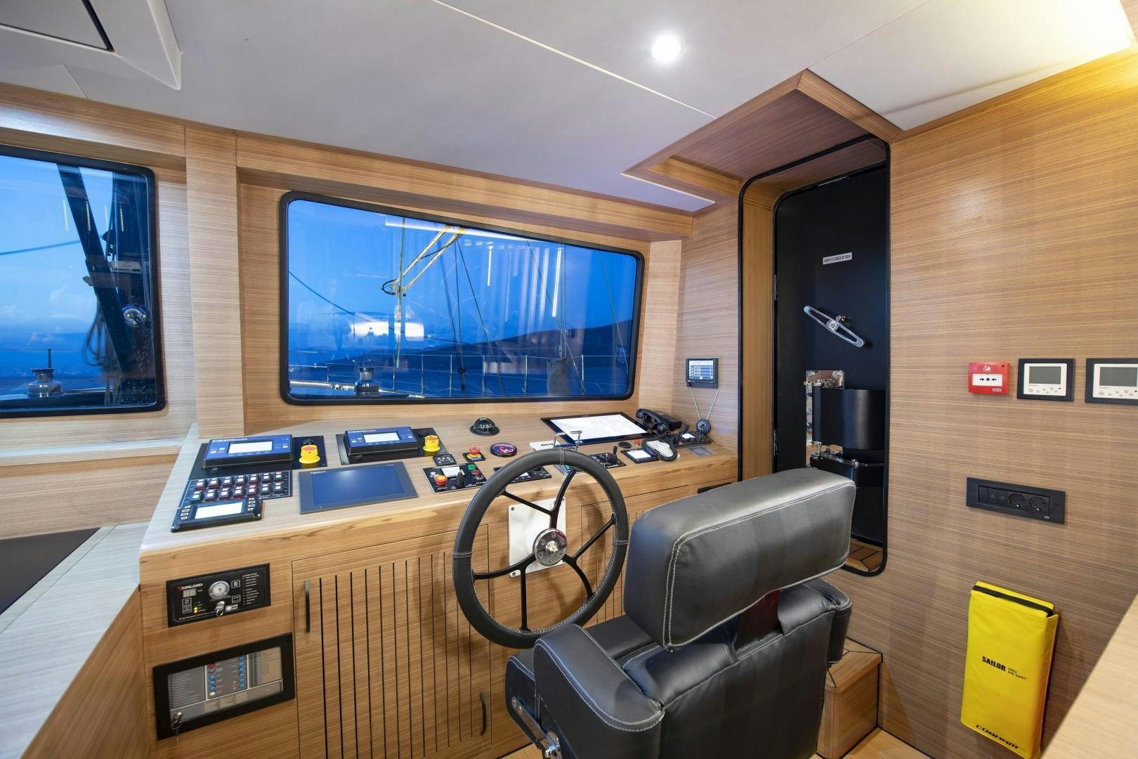 a room with a desk and a computer aboard MITI ONE Yacht for Sale