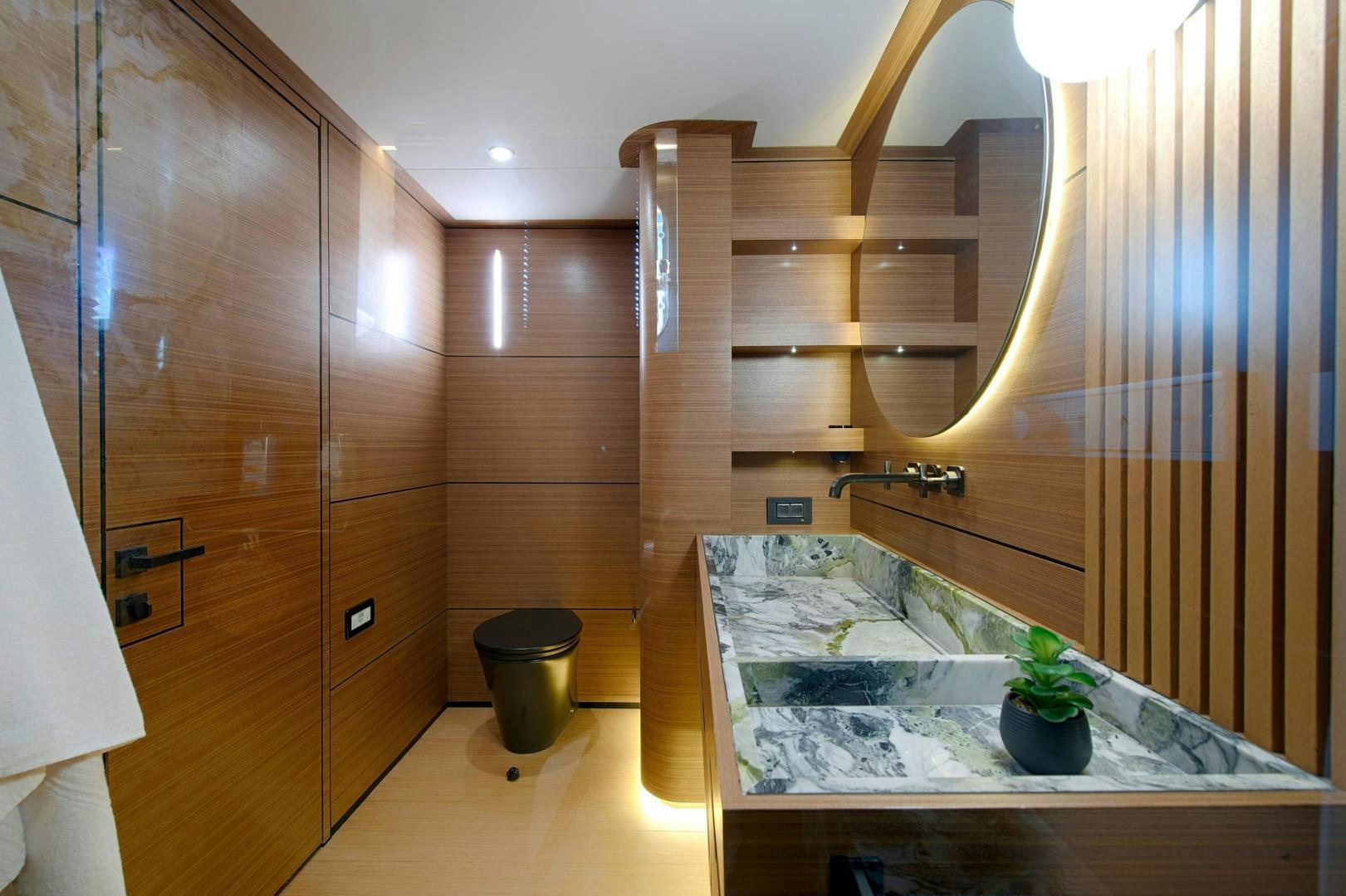 a bathroom with a large wooden shelf aboard MITI ONE Yacht for Sale