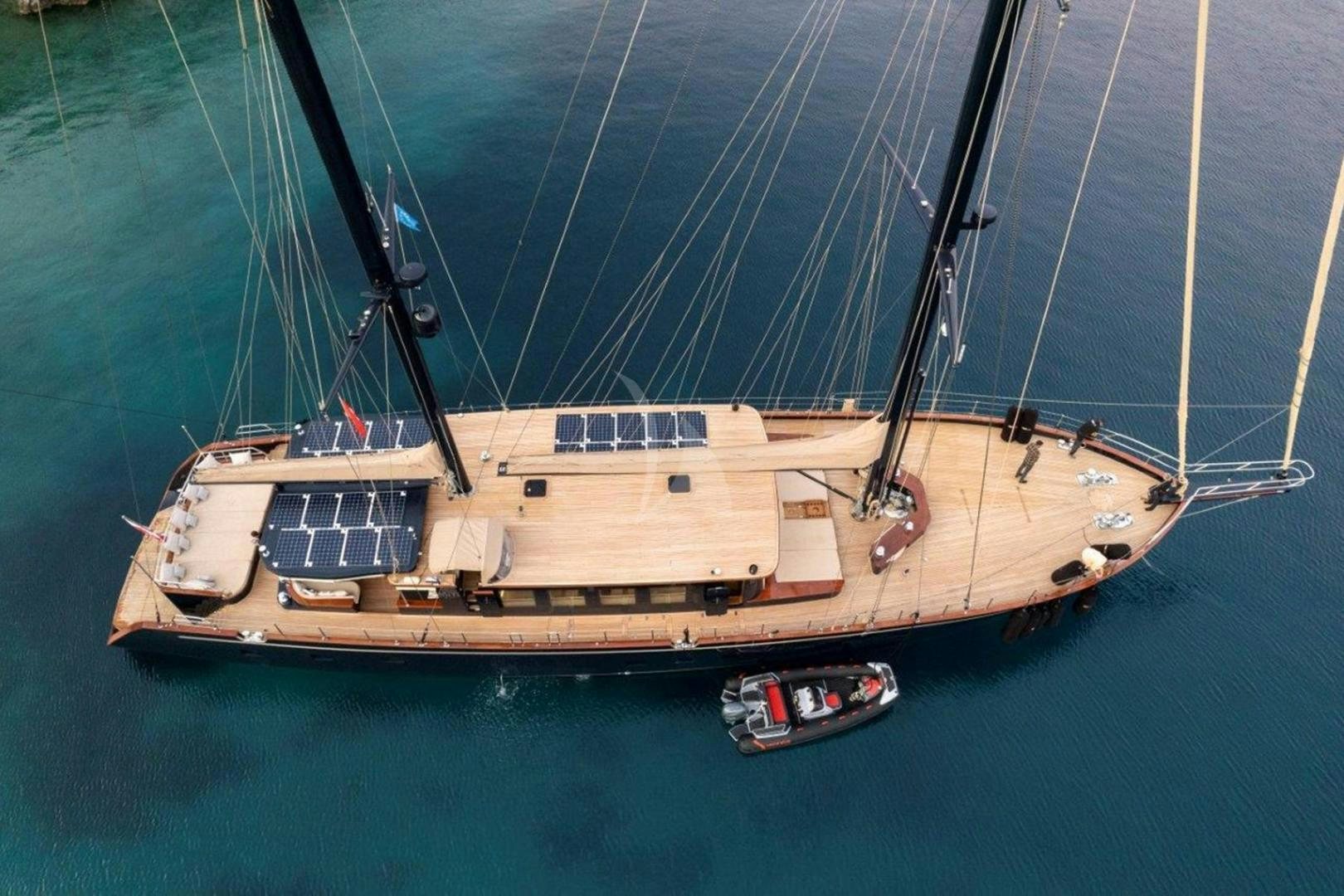 a boat with a large sail aboard MITI ONE Yacht for Sale
