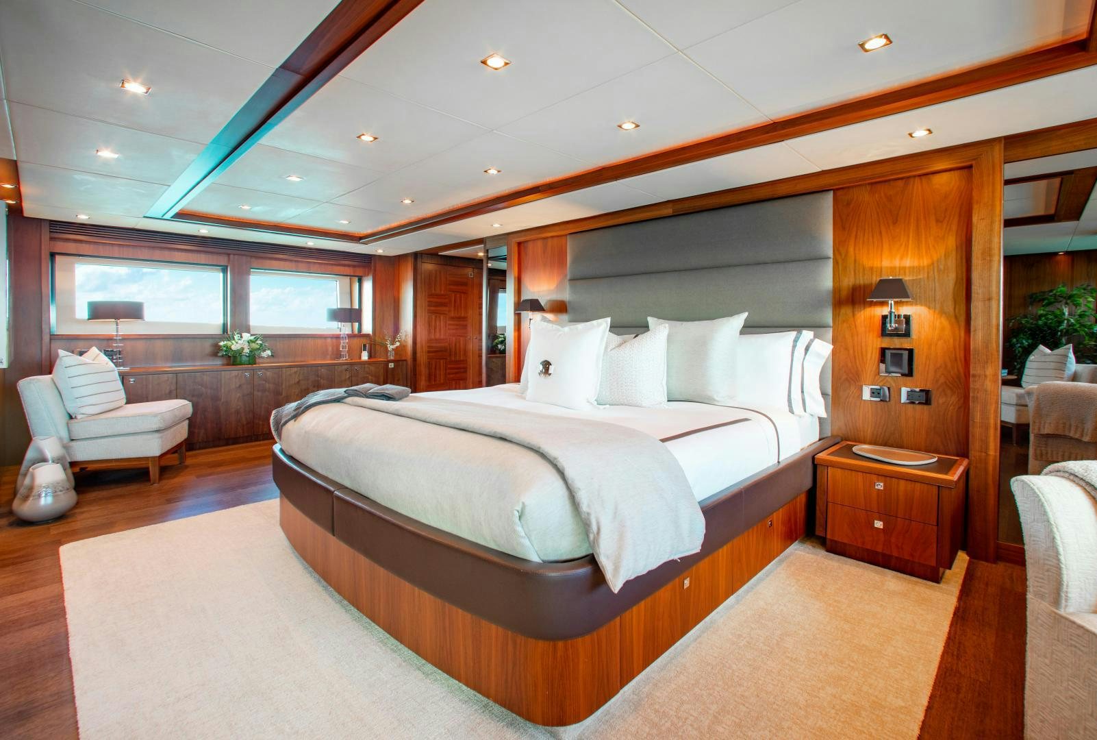 a large bed in a room aboard ACACIA Yacht for Sale