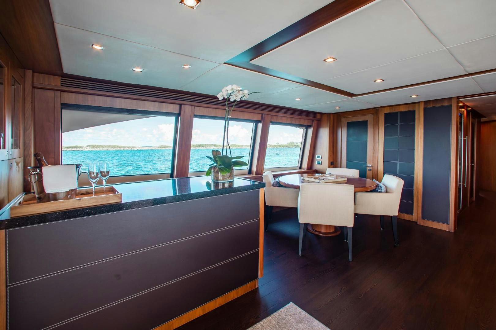 a kitchen with a large window aboard ACACIA Yacht for Sale