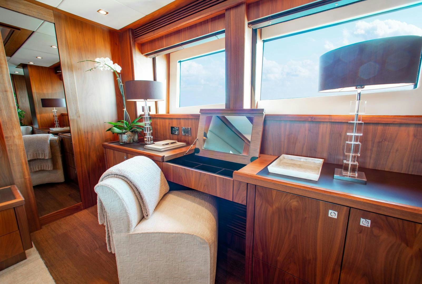 a room with a desk and a bed aboard ACACIA Yacht for Sale
