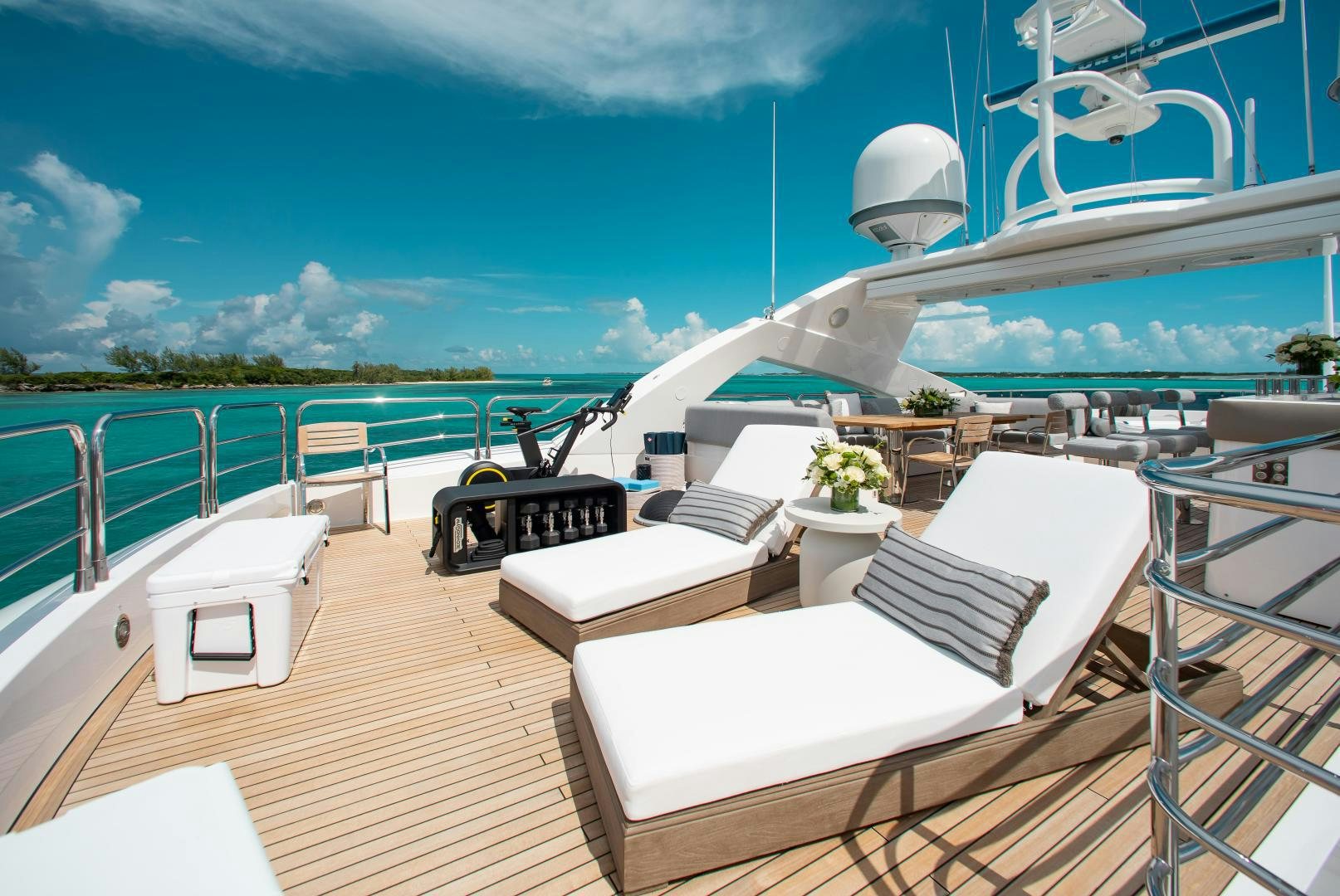 a deck with a large pool aboard ACACIA Yacht for Sale