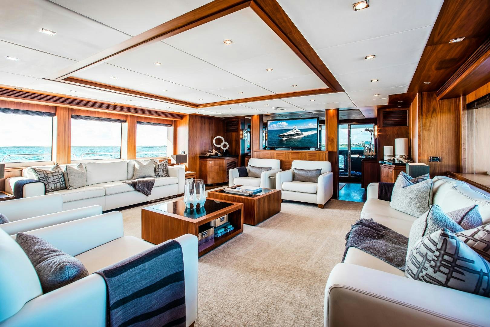 a living room with a large window aboard ACACIA Yacht for Sale