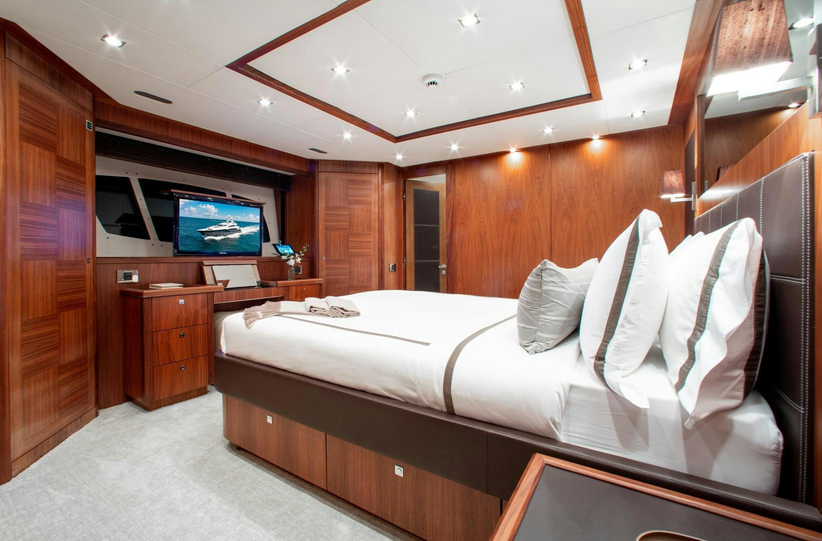 a bed in a room aboard ACACIA Yacht for Sale