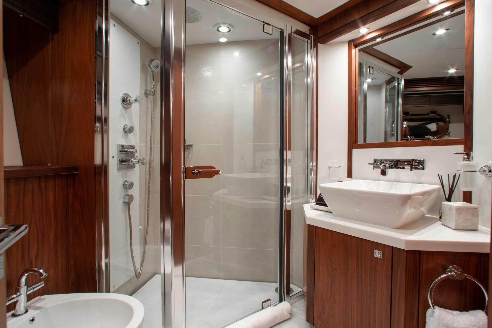 a bathroom with a shower unit and sink aboard ACACIA Yacht for Sale