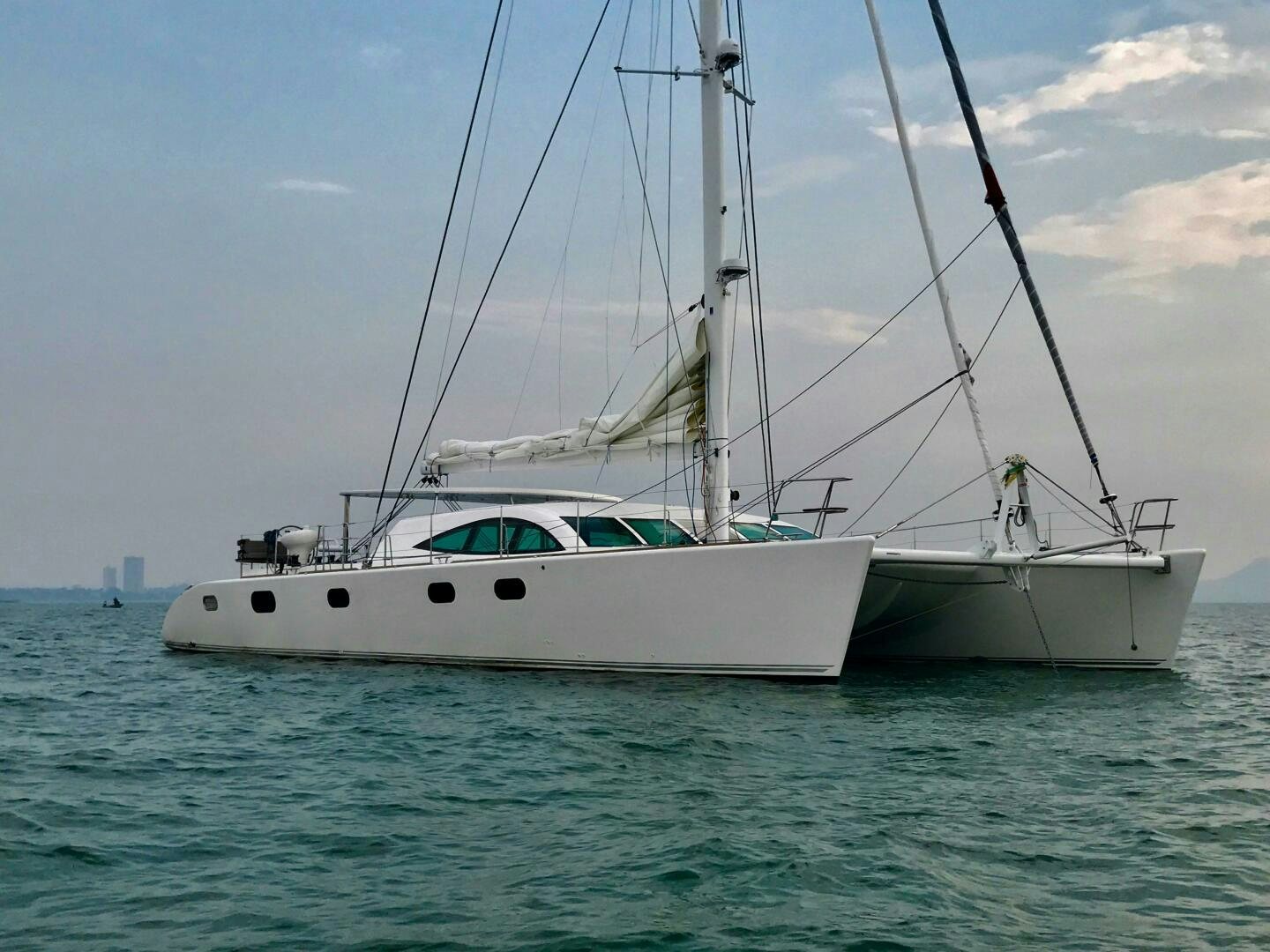 a couple of white boats in the water aboard LAYSAN Yacht for Sale