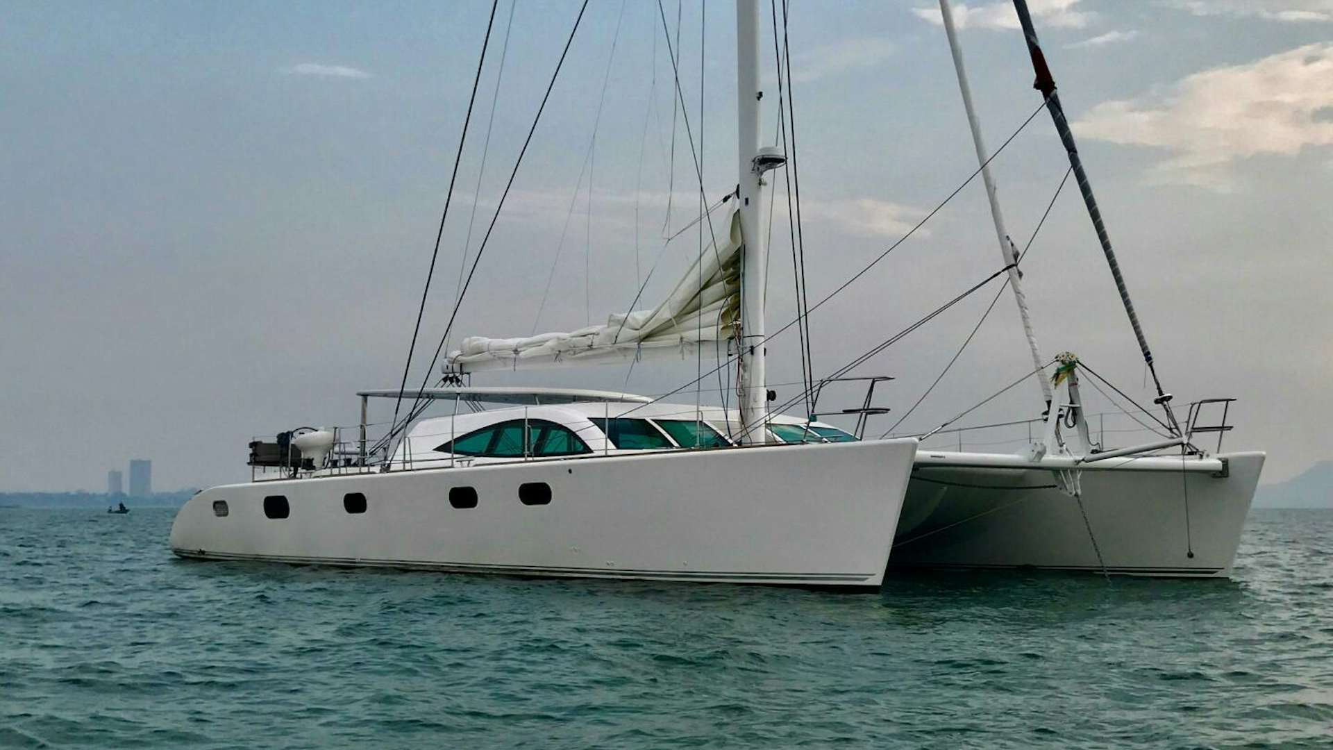 a couple of white boats in the water aboard LAYSAN Yacht for Sale