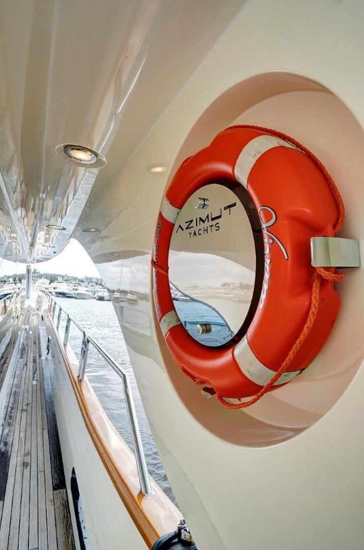 a red and white helmet aboard VIVERE Yacht for Sale