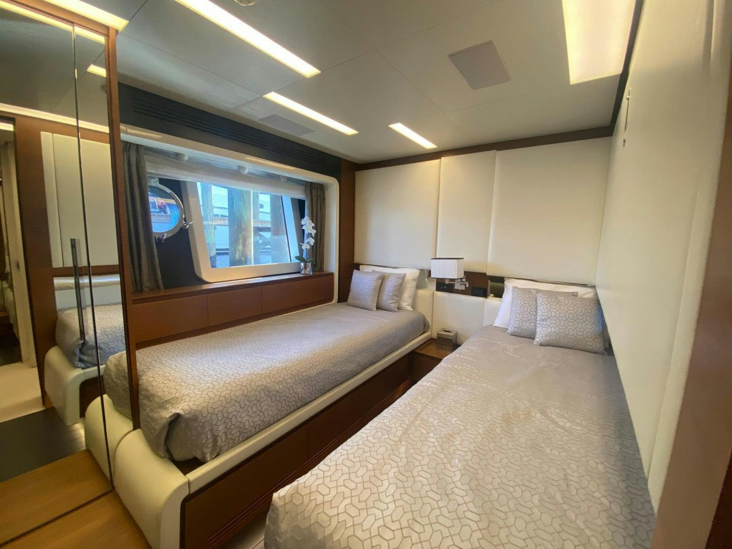 a bed in a room aboard LA TACHE Yacht for Sale