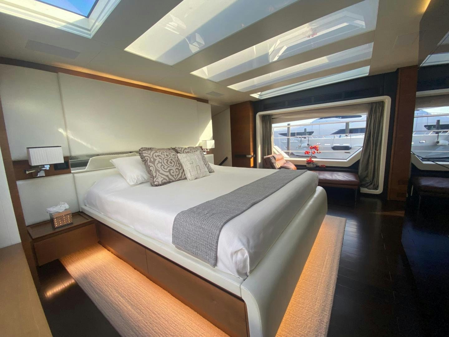 a bedroom with a large bed aboard LA TACHE Yacht for Sale