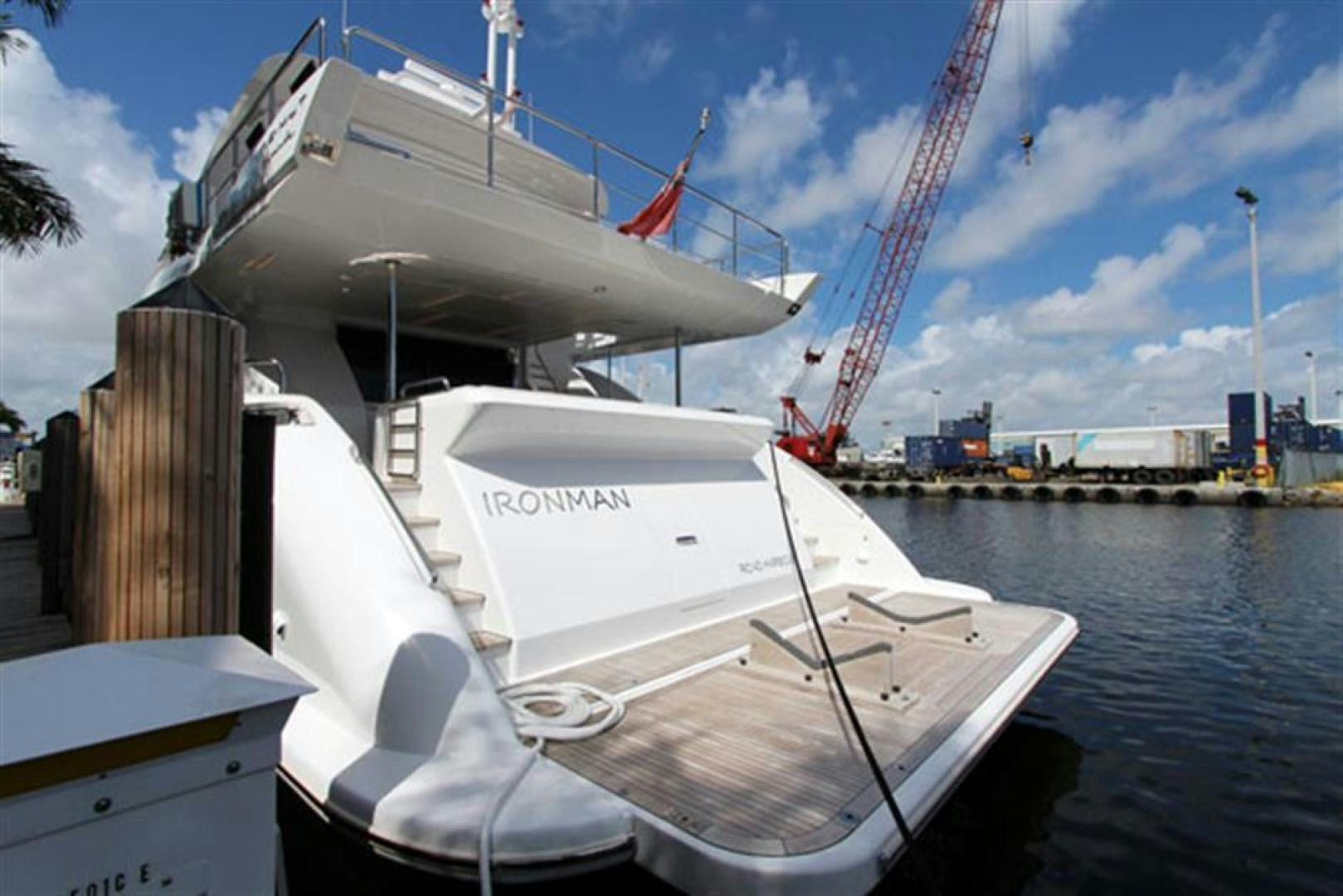 a boat docked at a pier aboard LA TACHE Yacht for Sale