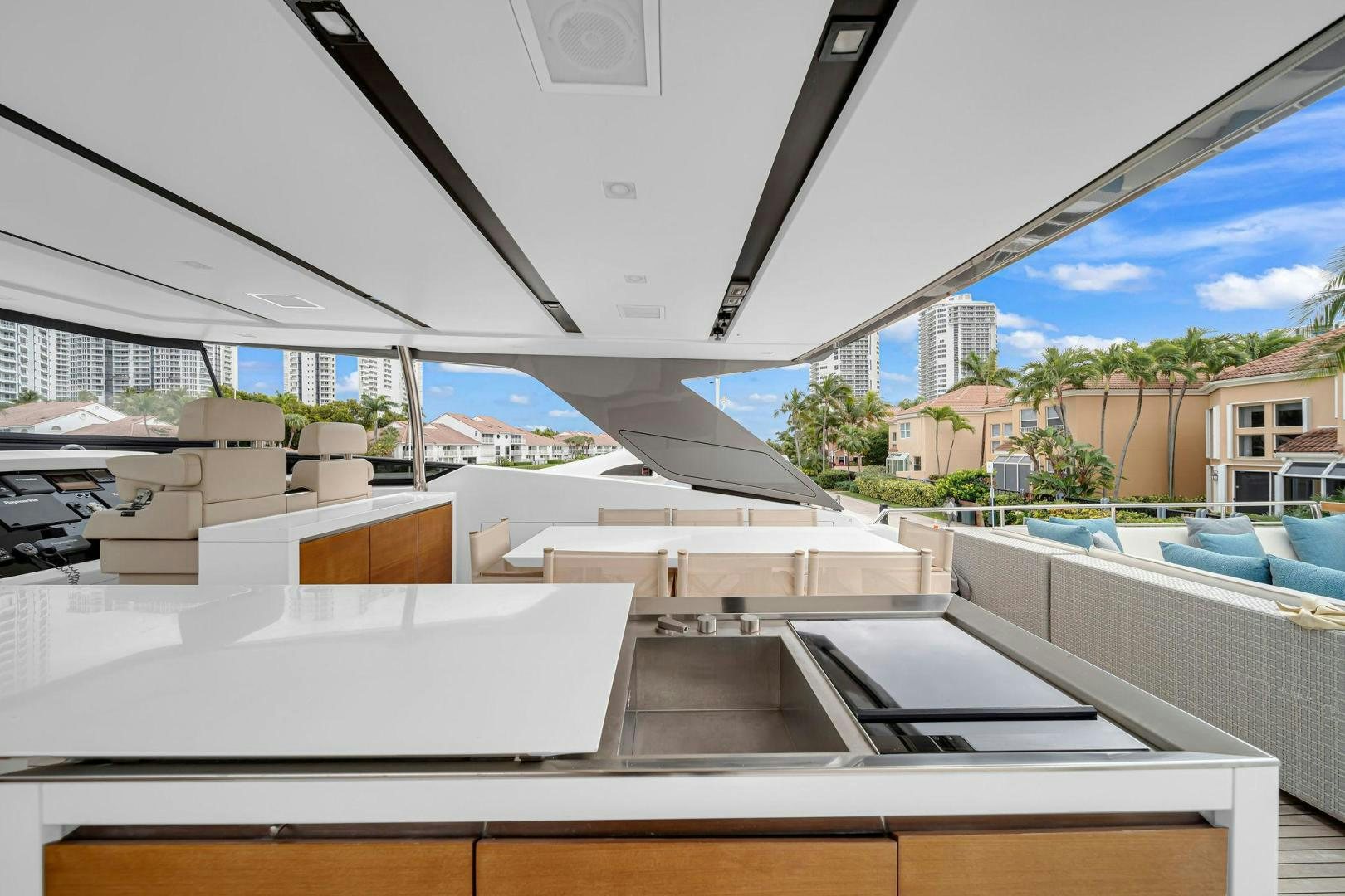 a rooftop of a building with a pool and a large glass roof aboard PEACEKEEPER Yacht for Sale