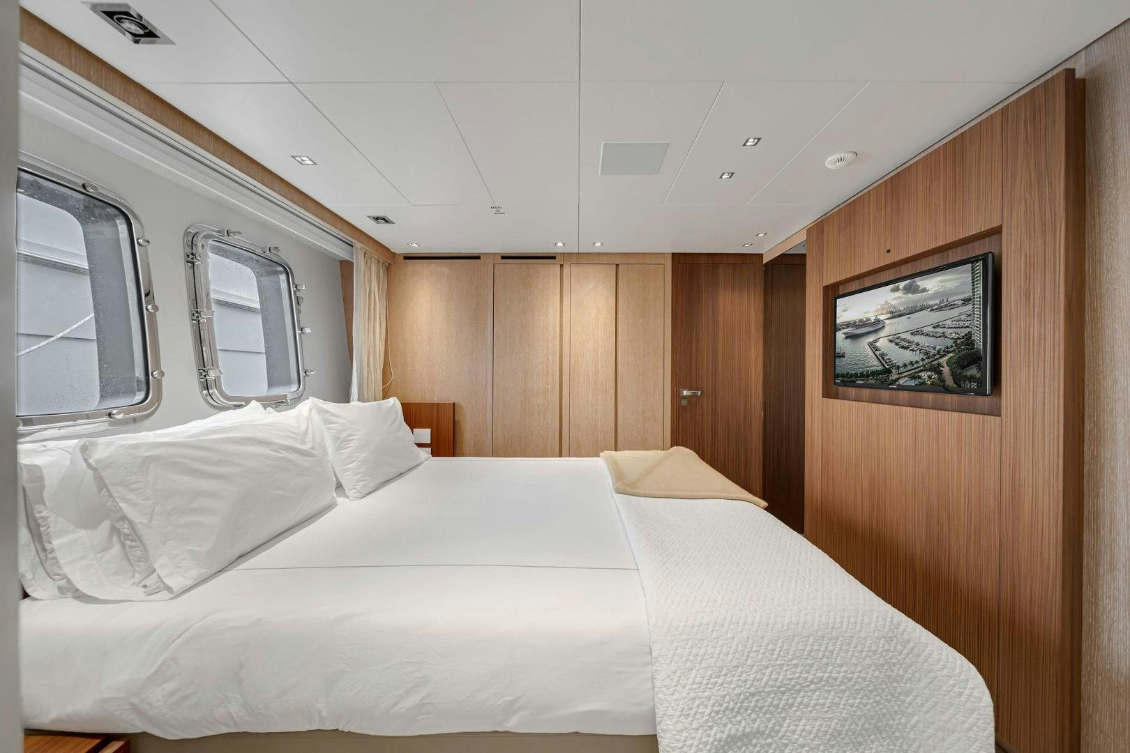 a bed in a room aboard PEACEKEEPER Yacht for Sale