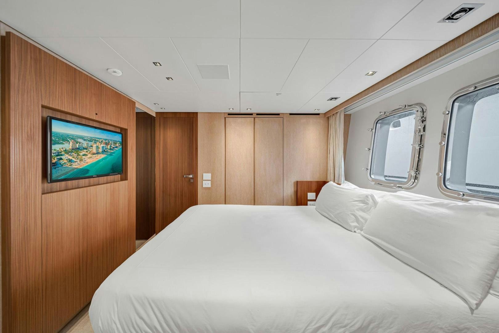 a bed in a room aboard PEACEKEEPER Yacht for Sale