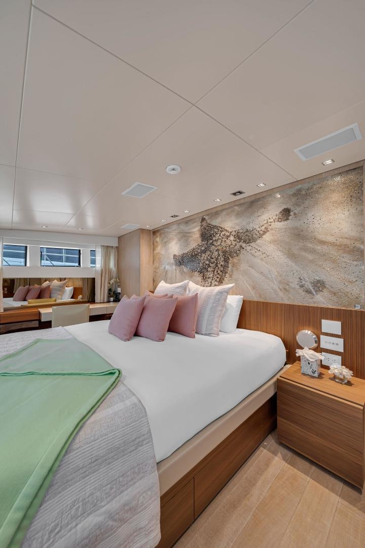 a bed in a room aboard PEACEKEEPER Yacht for Sale