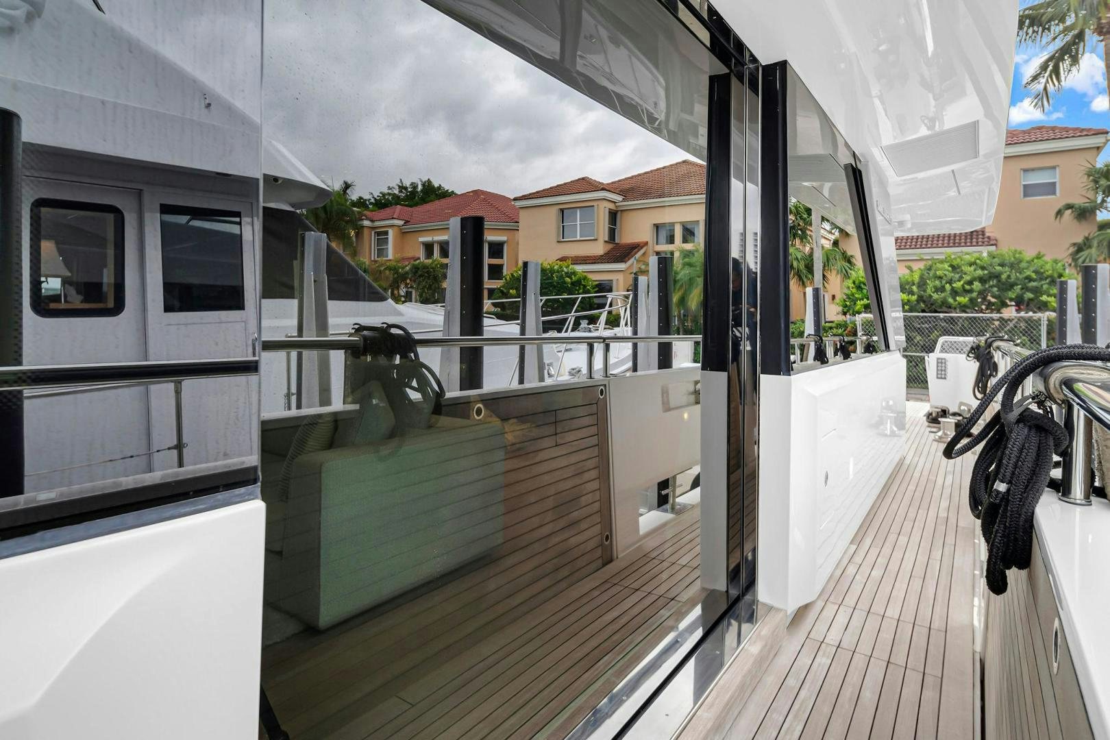 a balcony with a bike on it aboard PEACEKEEPER Yacht for Sale