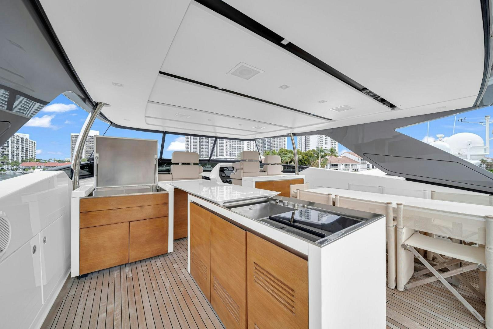a kitchen with a large window aboard PEACEKEEPER Yacht for Sale