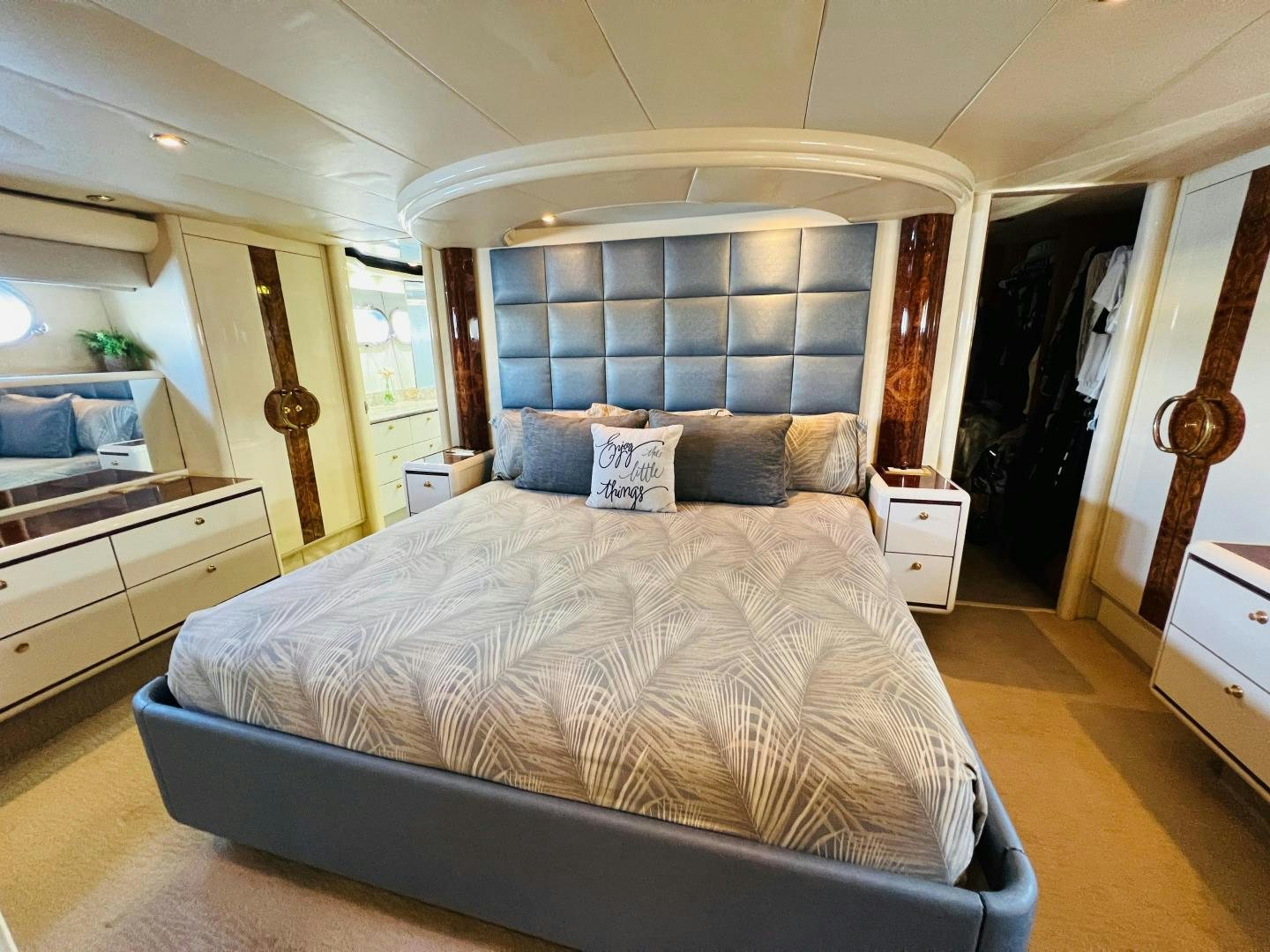 a large bed in a room aboard MAGIC MOMENTS Yacht for Sale