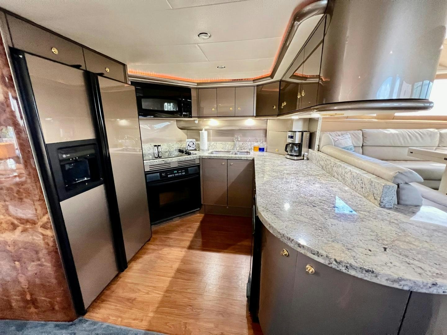a kitchen with a large countertop aboard MAGIC MOMENTS Yacht for Sale