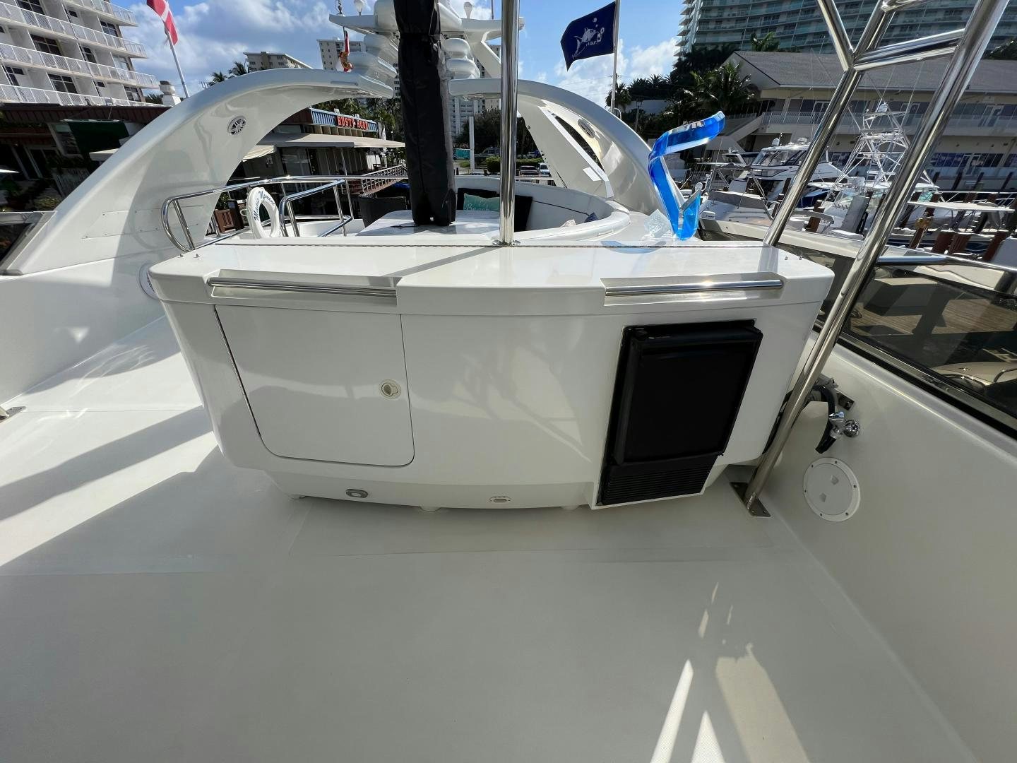 a white helicopter on a street aboard MAGIC MOMENTS Yacht for Sale