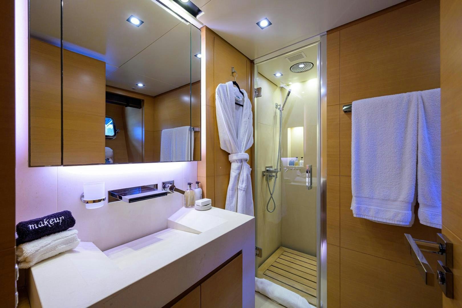a bathroom with a large mirror aboard AWAY Yacht for Sale