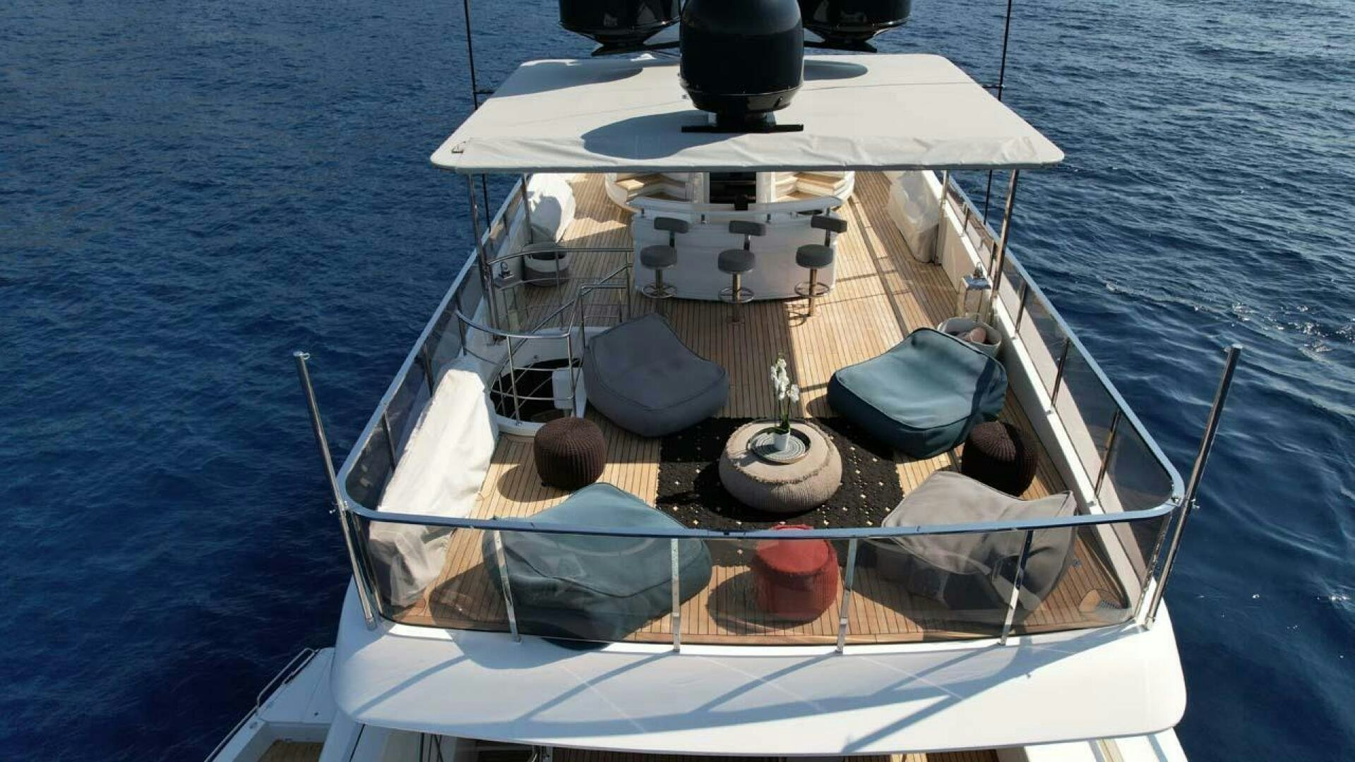 a boat with a large stack of chairs on it aboard AWAY Yacht for Sale