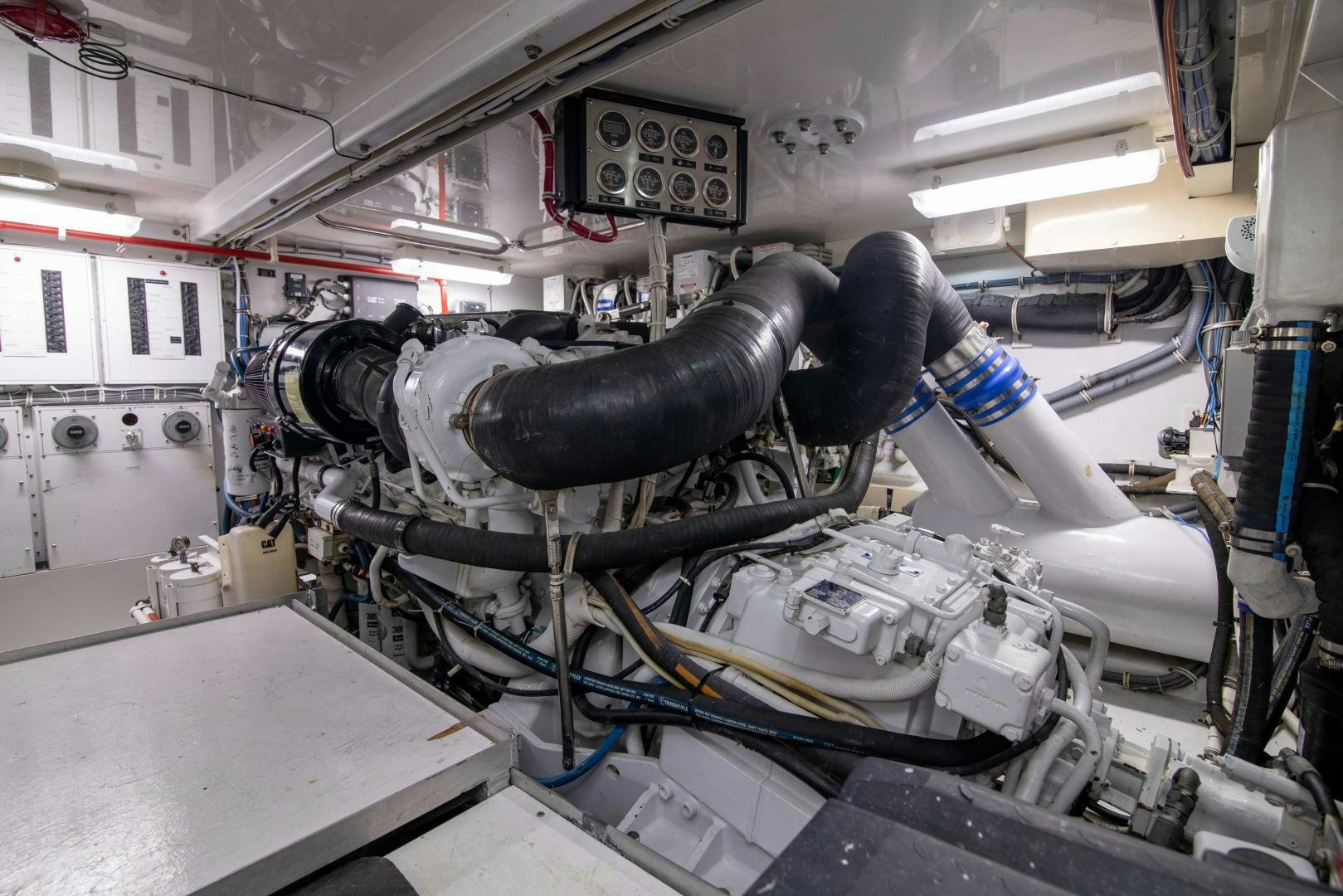 a person working on a car aboard IONA LOUISE Yacht for Sale