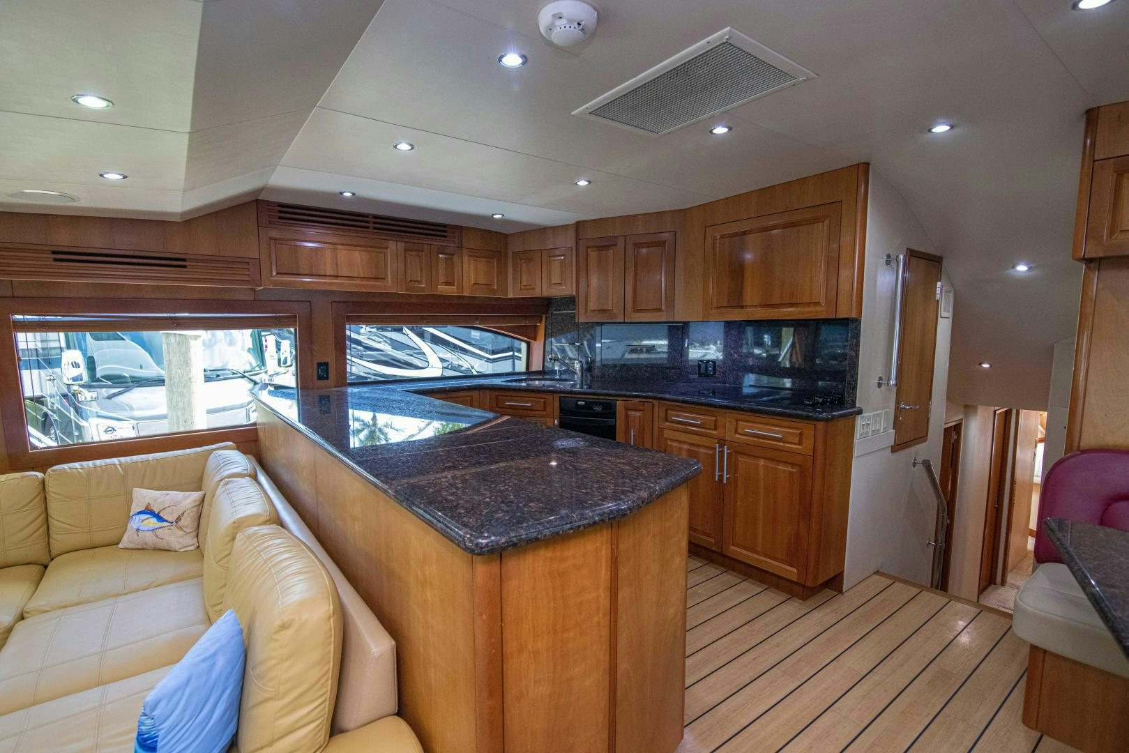 a kitchen with a large island aboard IONA LOUISE Yacht for Sale