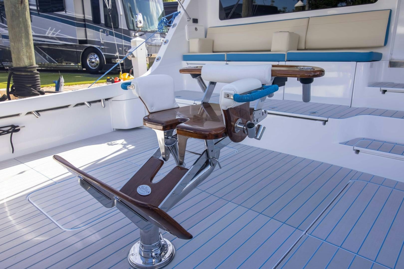 a wooden table on a deck aboard IONA LOUISE Yacht for Sale